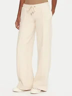 Spodnie sportowe damskie - Guess Jeans Spodnie dresowe W5BB04 KC811 Beżowy Wide Leg - miniaturka - grafika 1