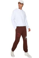 Dresy męskie - TRENDYOL MAN MĘSKIE SPODNIE DRESOWE BRĄZOWE Z NADRUKIEM XL 5DA - miniaturka - grafika 1