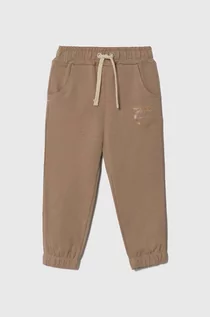 Spodnie i spodenki dla dziewczynek - Pinko Up spodnie dresowe dziecięce kolor beżowy z nadrukiem - grafika 1