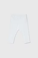 Spodnie i spodenki dla dziewczynek - United Colors of Benetton legginsy dziecięce kolor biały gładkie - miniaturka - grafika 1