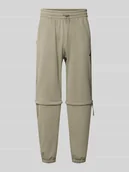 Spodnie sportowe męskie - Spodnie dresowe o kroju relaxed fit z nadrukiem z logo - miniaturka - grafika 1