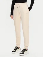 Spodnie sportowe damskie - Guess Spodnie dresowe V3BB27 KBXI2 Beżowy Regular Fit - miniaturka - grafika 1