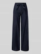 Spodnie damskie - Jeansy z szeroką nogawką i wiązanym paskiem model ‘Sienna’ - miniaturka - grafika 1