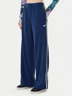 Spodnie sportowe damskie - adidas Spodnie dresowe adicolor Firebird JV7524 Granatowy Regular Fit - miniaturka - grafika 1