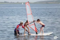 Vouchery - Surfszkola przy molo w jastarni Kurs Windsurfingu "Bąbel" dla dzieci w Jastarni - miniaturka - grafika 1