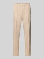 Spodnie sportowe męskie - Spodnie dresowe o kroju regular fit z dodatkiem bawełny - miniaturka - grafika 1