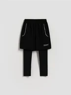 Spodnie i spodenki dla chłopców - Reserved - Sportowe leginsy z szortami - czarny - miniaturka - grafika 1