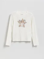 Bluzki dla dziewczynek - Reserved - Bluzka z błyszczącym nadrukiem - złamana biel - miniaturka - grafika 1