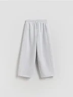 Spodnie i spodenki dla dziewczynek - Reserved - Spodnie dresowe z ociepleniem - jasnoszary - miniaturka - grafika 1