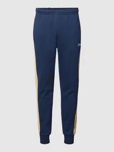 Spodnie dresowe w stylu Colour Blocking - Spodnie sportowe męskie - miniaturka - grafika 1