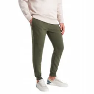 Dresy męskie - Spodnie dresowe męskie z tkaniny ottoman ciemnooliwkowe V3 OM-PASK-0129 XL - miniaturka - grafika 1