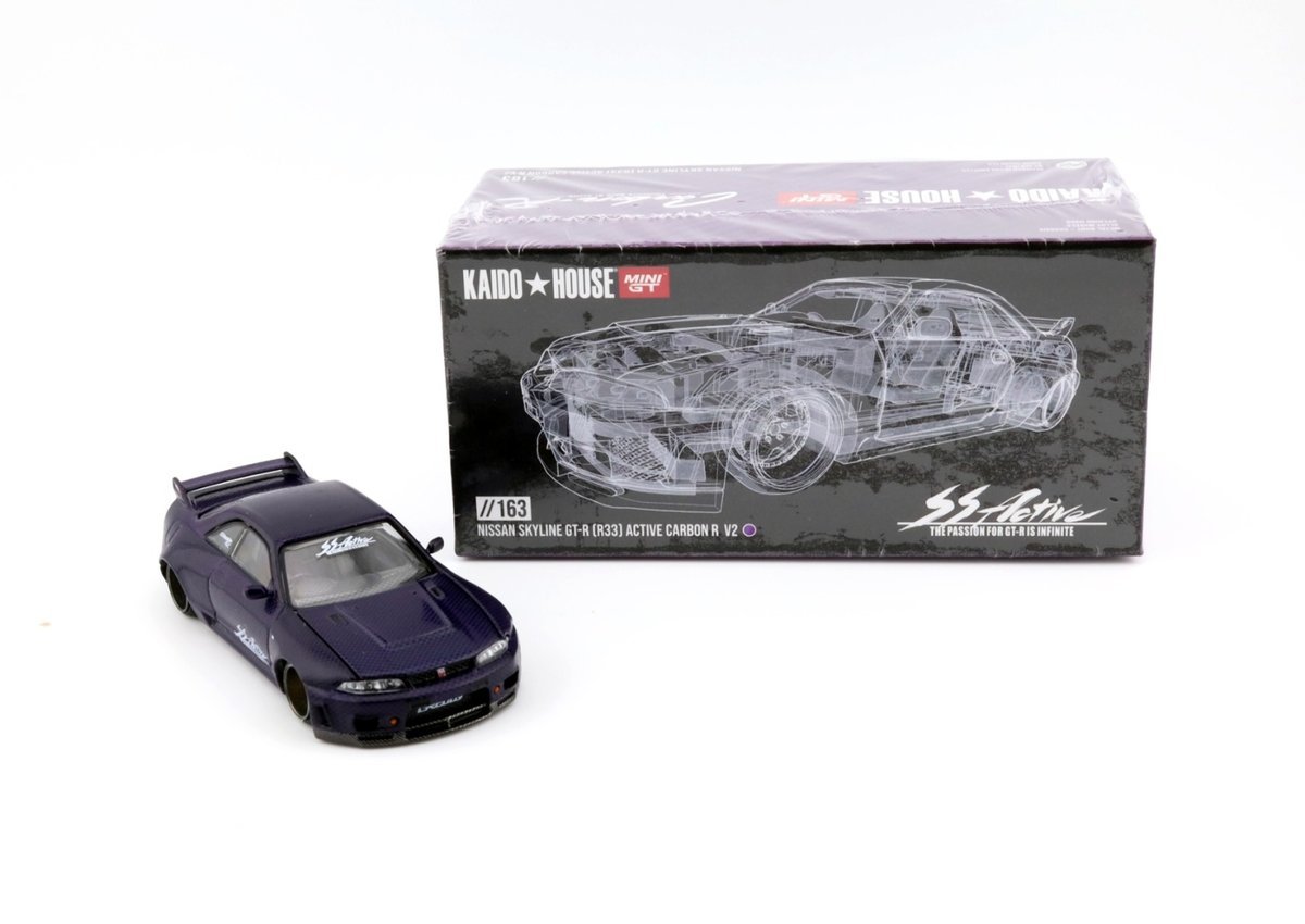MINI GT Kaido House 163 Nissan Skyline GT-R R33 Active Carbon R V2 MiniGT KHMG163
