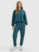 Spodnie sportowe damskie - 4F Spodnie dresowe joggery z modalem damskie - turkusowe XXL - miniaturka - grafika 1