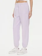 Spodnie sportowe damskie - Calvin Klein Jeans Spodnie dresowe Monologo LV047B235G Fioletowy Regular Fit - miniaturka - grafika 1
