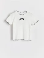 Koszulki dla dziewczynek - Reserved - Bawełniana bluzka z kokardą - wielobarwny - miniaturka - grafika 1