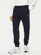 Spodnie sportowe męskie - Champion Spodnie dresowe 220299 Granatowy Slim Fit - miniaturka - grafika 1