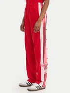Spodnie sportowe damskie - adidas Spodnie dresowe Adibreak KD6324 Czerwony Loose Fit - miniaturka - grafika 1