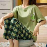 Piżamy damskie - Piżama z dinozaurem - Zielony XL - miniaturka - grafika 1