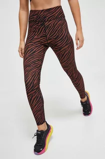 Legginsy - Rip Curl legginsy treningowe Mirage Sun Tribe kolor brązowy wzorzyste - grafika 1