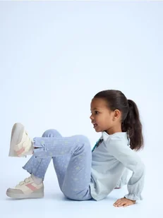 Reserved - Legginsy flare z kokardkami - jasnoniebieski - Spodnie i spodenki dla dziewczynek - miniaturka - grafika 1