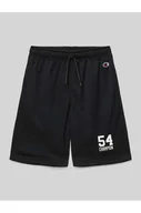 Spodnie sportowe damskie - Szorty z dzianiny dresowej o kroju regular fit z nadrukiem z logo - Champion - miniaturka - grafika 1
