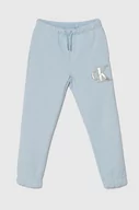 Spodnie i spodenki dla dziewczynek - Calvin Klein Jeans spodnie dresowe dziecięce kolor niebieski z aplikacją - miniaturka - grafika 1