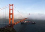 Plakaty - Fog rolls across the Golden Gate Bridge in San Francisco., Carol Highsmith - plakat 42x29,7 cm - miniaturka - grafika 1