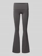 Spodnie damskie - Legginsy o rozkloszowanym kroju z elastycznym pasem - miniaturka - grafika 1