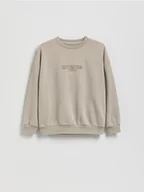 Kurtki i płaszcze dla chłopców - Reserved - Bluza z nadrukiem - beżowy - miniaturka - grafika 1