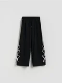 Spodnie i spodenki dla dziewczynek - Reserved - Spodnie dresowe z kokardkami - czarny - miniaturka - grafika 1