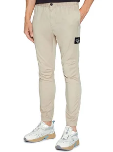 Calvin Klein Spodnie w kolorze beżowym - Spodnie męskie - miniaturka - grafika 1