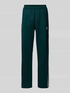 Spodnie sportowe o kroju regular fit z detalem z logo - Spodnie sportowe damskie - miniaturka - grafika 1