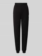 Spodnie sportowe damskie - Spodnie dresowe o kroju regular fit z wyhaftowanym logo model ‘NELFINIA’ - miniaturka - grafika 1