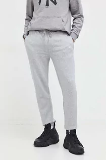 Spodnie męskie - New Era spodnie dresowe kolor szary melanżowe - grafika 1