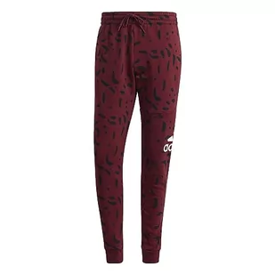 adidas Męskie spodnie Essentials ze zwężanym mankietem z logo na całej długości (1/1), Cień czerwony, M - Spodenki męskie - miniaturka - grafika 1