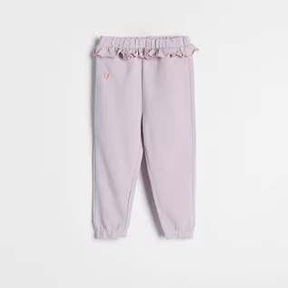 Spodnie i spodenki dla dziewczynek - Reserved - Spodnie z falbanką - Fioletowy - grafika 1