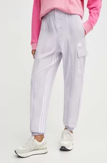 Spodnie damskie - adidas spodnie dresowe kolor fioletowy z aplikacją IS0907 - grafika 1