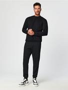 Spodnie męskie - Sinsay - Spodnie dresowe slim jogger - czarny - miniaturka - grafika 1