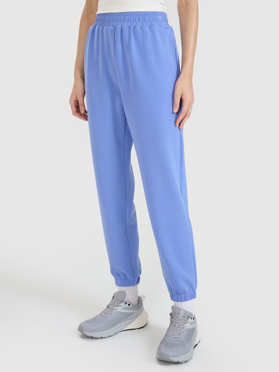 4F Spodnie damskie dresowe joggery z modalem 4FWSS25TTROF1010-33S Niebieski Roz. XL