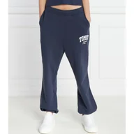 Dresy damskie - Tommy Jeans Spodnie dresowe | flare fit - miniaturka - grafika 1