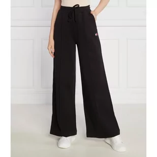 Tommy Jeans Spodnie dresowe TJW XS BADGE STRT LEG | flare fit - Dresy damskie - miniaturka - grafika 1