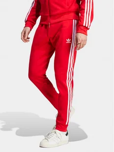 adidas Spodnie dresowe adicolor Classics SST IM4543 Czerwony Slim Fit - Spodnie sportowe męskie - miniaturka - grafika 1