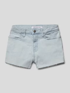 Spodnie i spodenki dla dziewczynek - Szorty jeansowe z postrzępionym zakończeniem nogawek - grafika 1