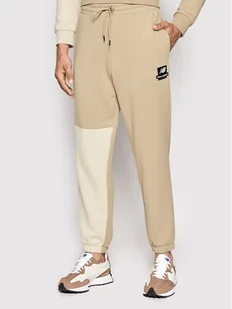 NEW BALANCE Spodnie dresowe MP21550 Beżowy Regular Fit - Spodnie sportowe męskie - miniaturka - grafika 1