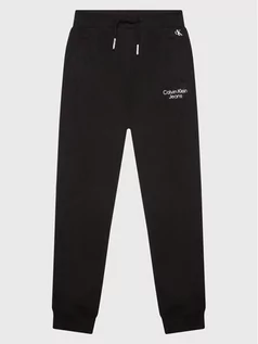 Spodnie i spodenki dla dziewczynek - Calvin Klein Jeans Spodnie dresowe Stack Logo IB0IB01282 Czarny Regular Fit - grafika 1