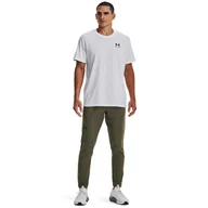 Spodnie sportowe męskie - Męskie spodnie treningowe UNDER ARMOUR  UNSTOPPABLE TAPERED PANTS - oliwkowe/khaki - miniaturka - grafika 1