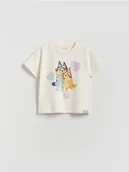 Bluzki dla niemowląt - Reserved - Bawełniany t-shirt Bluey - złamana biel - miniaturka - grafika 1