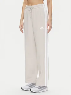 adidas Spodnie dresowe Essentials 3-Stripes JW9215 Beżowy Regular Fit - Spodnie sportowe damskie - miniaturka - grafika 1
