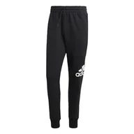 Spodenki męskie - adidas Męskie spodnie Essentials French Terry zwężane mankiety z logo, XXS krótkie czarne/białe - miniaturka - grafika 1