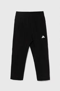 Spodnie i spodenki dla dziewczynek - adidas spodnie dresowe dziecięce kolor czarny gładkie - grafika 1